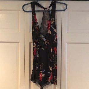 Beautiful black romper with floral design
